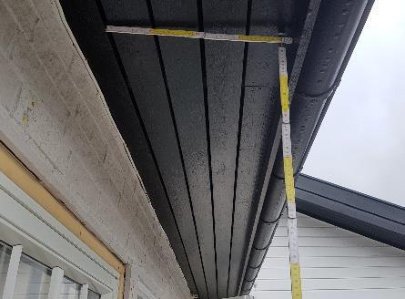 Måling av anleggsflate til takbrakettene under tak